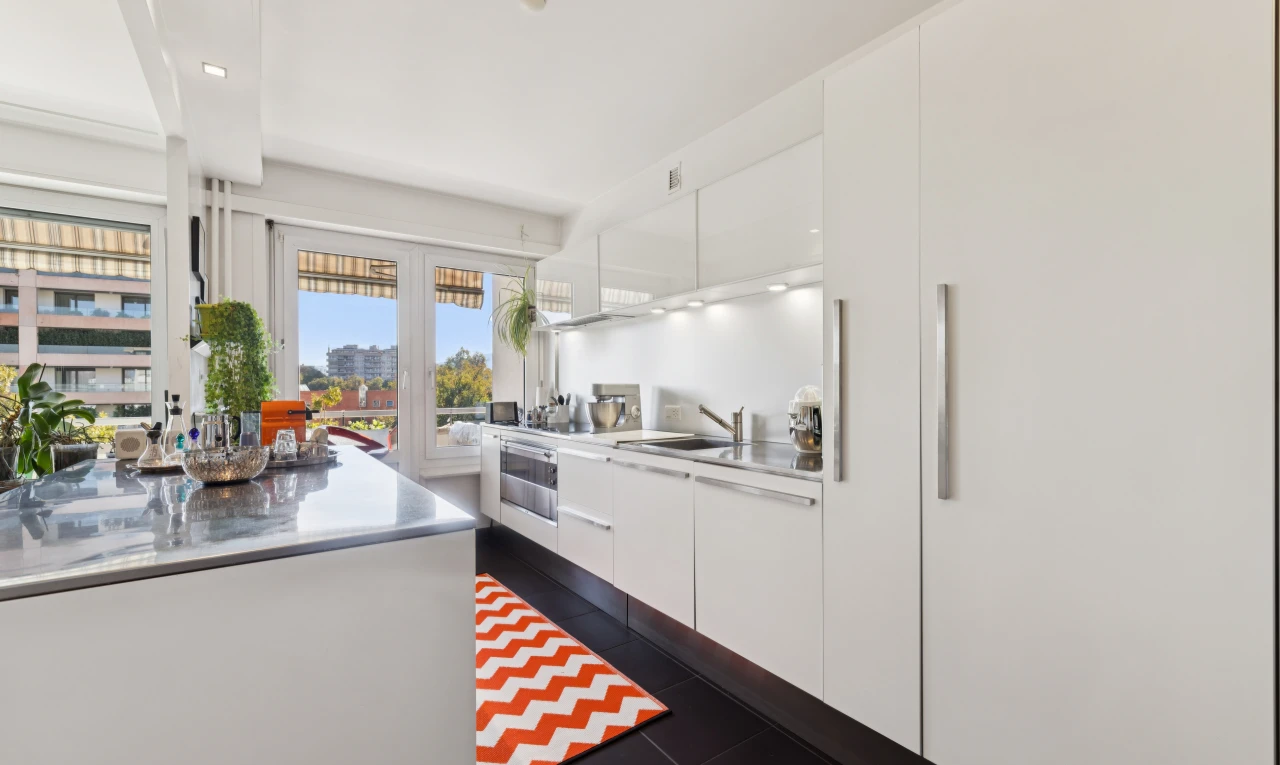 kitchen with modern cabinets, white cabinets, oven, and recessed lighting