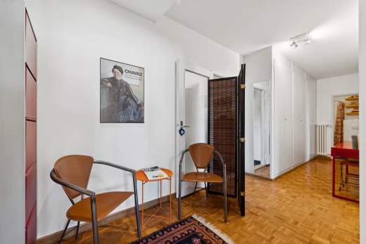 dining room with parquet flooring and baseboards