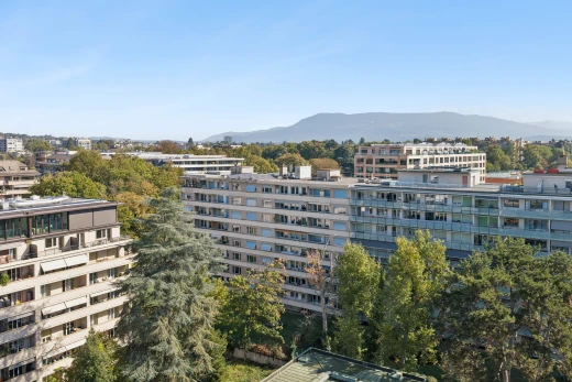 view of apartment building / complex with a mountain view