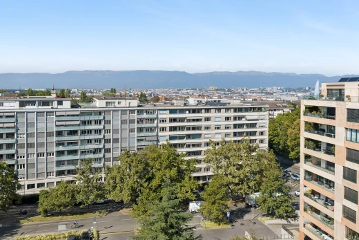 view of apartment building / complex with a mountain view