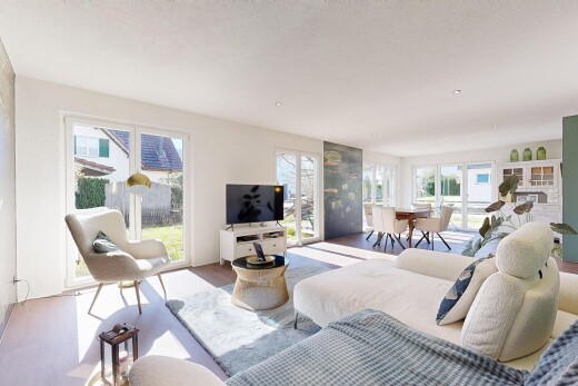 living room featuring plenty of natural light