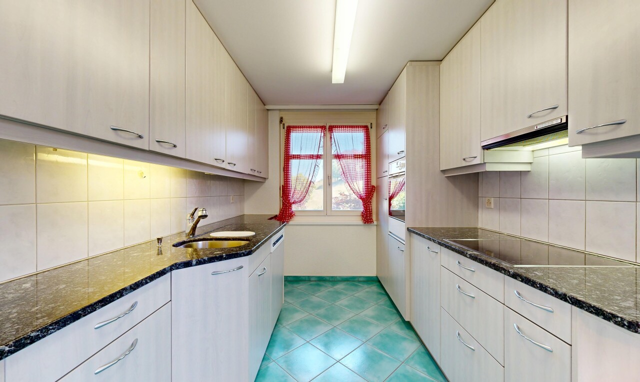 küche mit dark countertops, stone countertops, stein arbeitsplatten, natürliches licht, und natural light