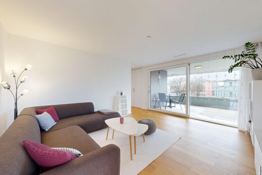 salon avec inside property, wood finish floor, sol en finition bois, drywall, et cloison sèche