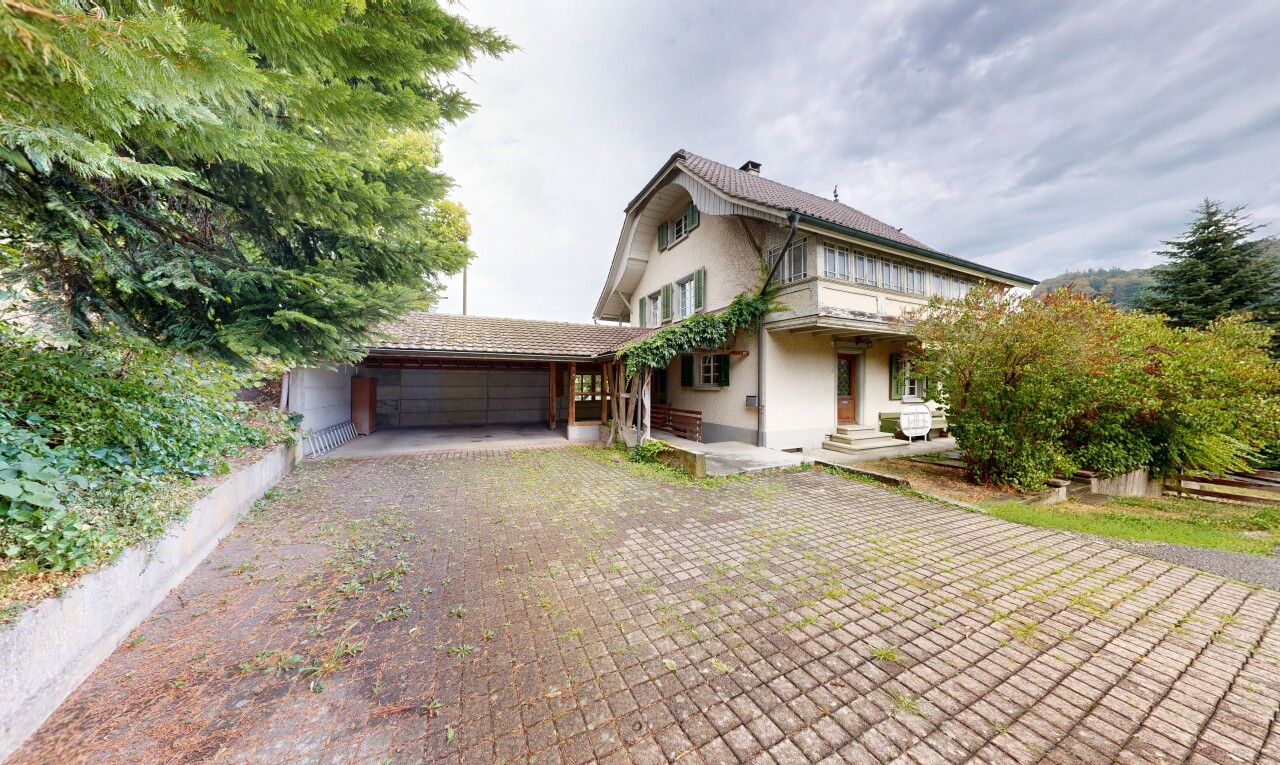 außenansicht mit auffahrt, property visible, overcast, garage angeschlossen, und from property