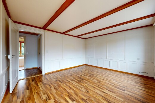leerer raum mit inside property, wood finish floor, holzfußboden, paneling wall, und wandvertäfelung
