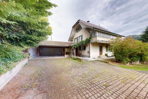 außenansicht mit auffahrt, property visible, overcast, garage angeschlossen, und from property
