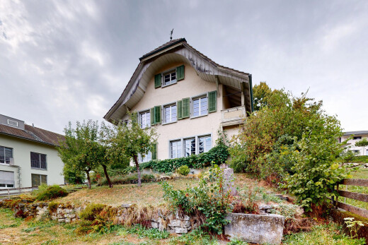 außenansicht mit overcast, property visible, zaun, und stuckverkleidung