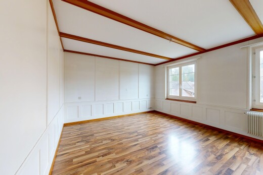 leerer raum mit paneling wall, wandvertäfelung, kühler, inside property, und wood finish floor
