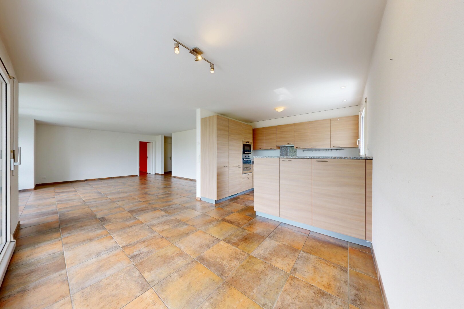 pièce vide avec drywall, cloison sèche, inside property, et light floor