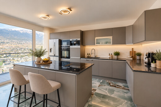 cuisine avec dark countertops, îlot de cuisine, kitchen island, armoires grises, et gray cabinets