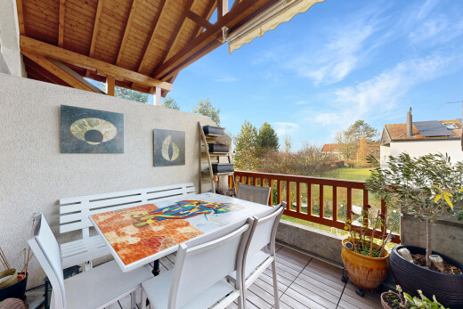 view of wooden deck featuring outdoor dining area