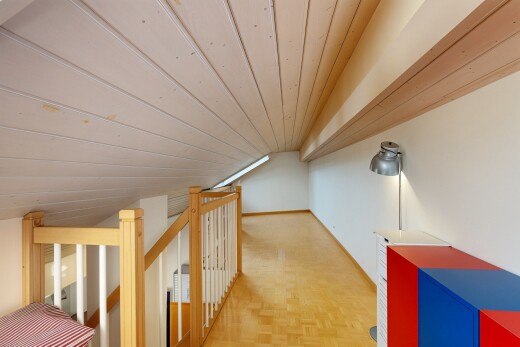 corridor with wooden ceiling and lofted ceiling