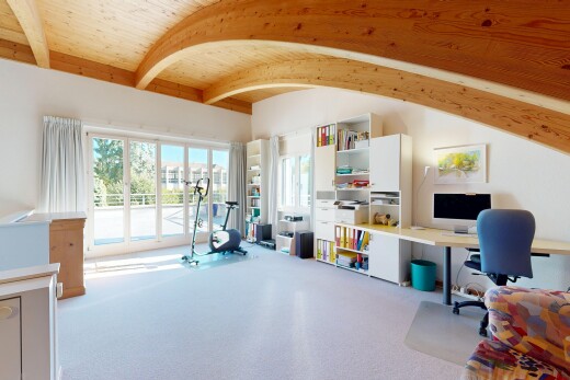 carpeted home office featuring a wooden ceiling with exposed beams and access to exterior