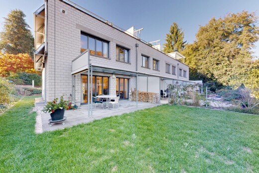 outdoor house featuring a yard and a patio area
