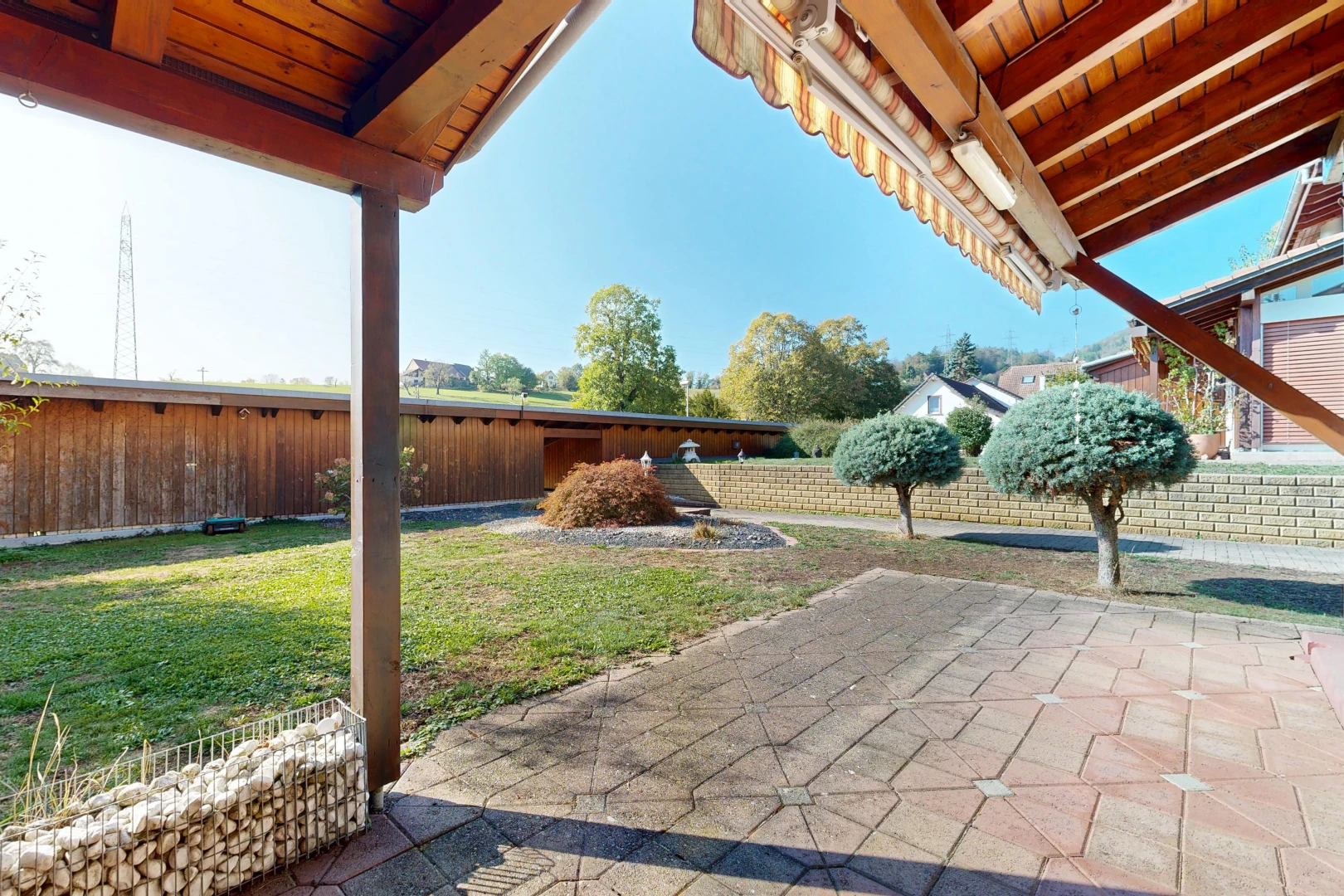 terrace featuring a fenced backyard and a patio area