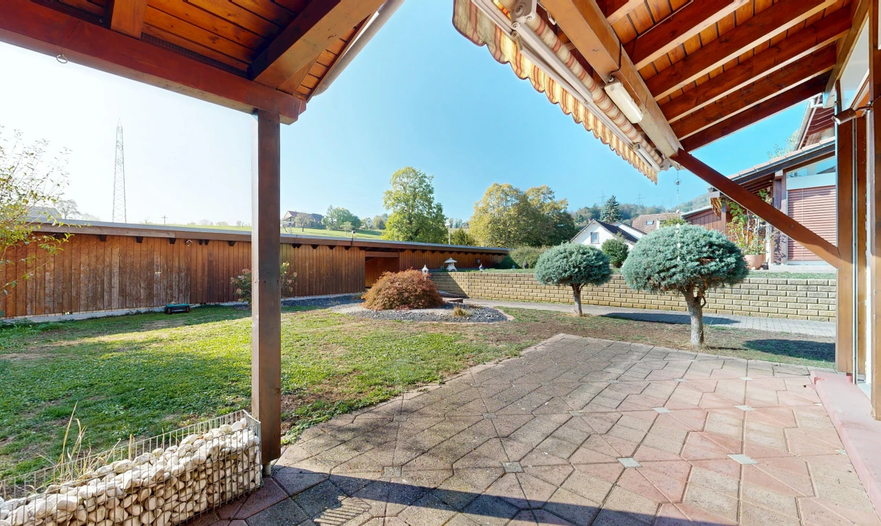 terrace featuring a fenced backyard and a patio area