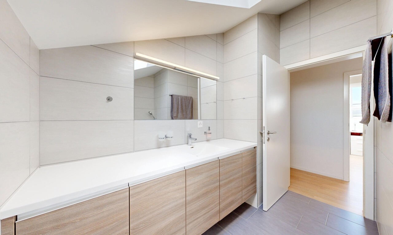 bathroom featuring vanity and light tile patterned floors