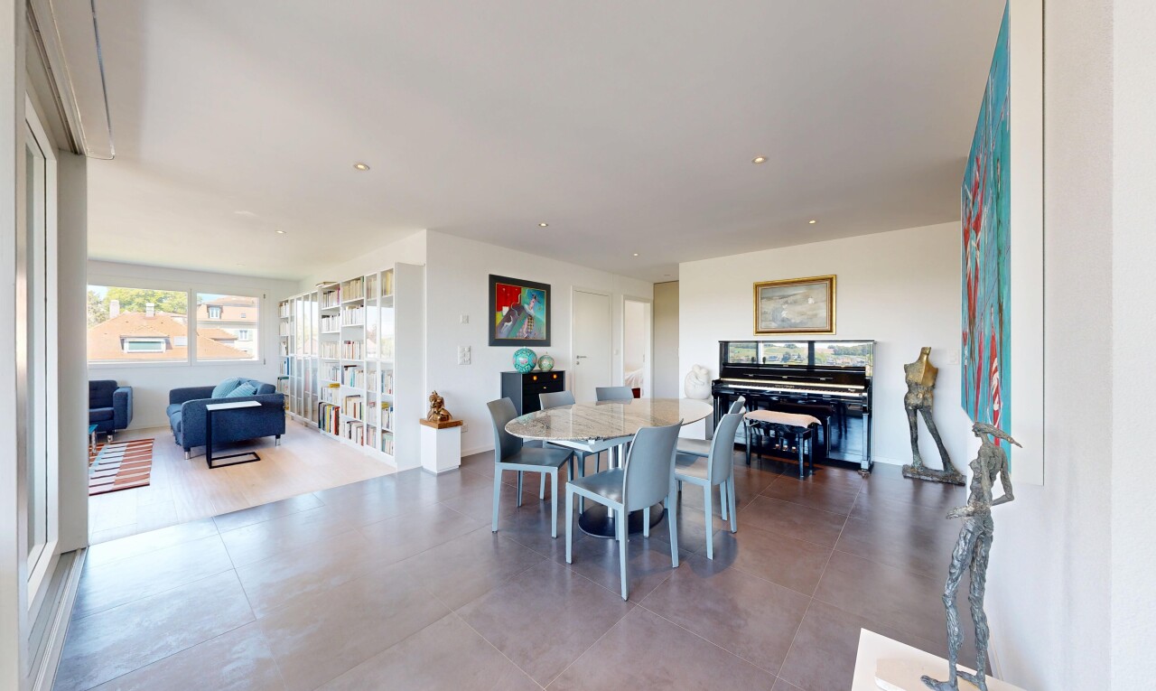 living / dining area with recessed lighting