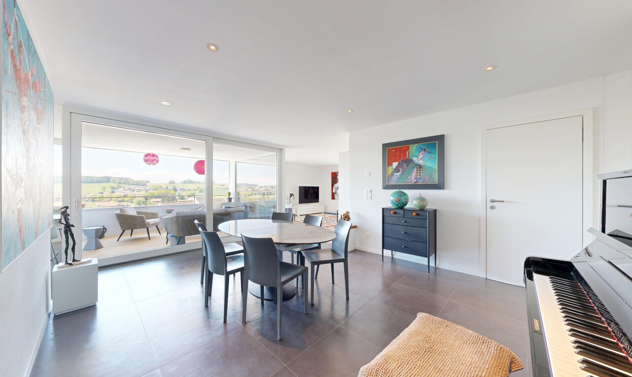 living room featuring expansive windows and recessed lighting