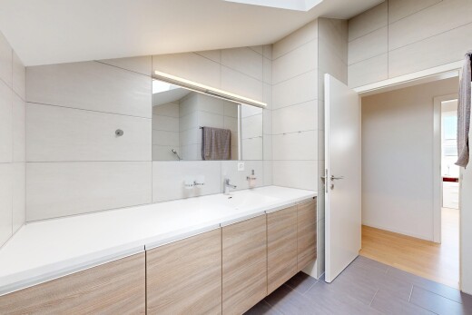 bathroom featuring vanity and light tile patterned floors