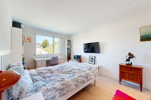 room with light wood-style floors and recessed lighting