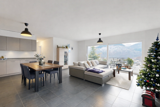 living / dining room with dark tile patterned flooring