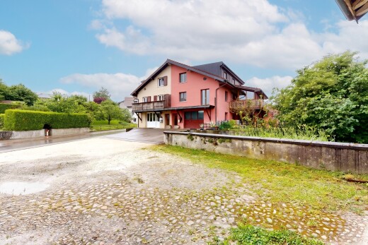 façade avec property visible, day time, et bardage en stuc