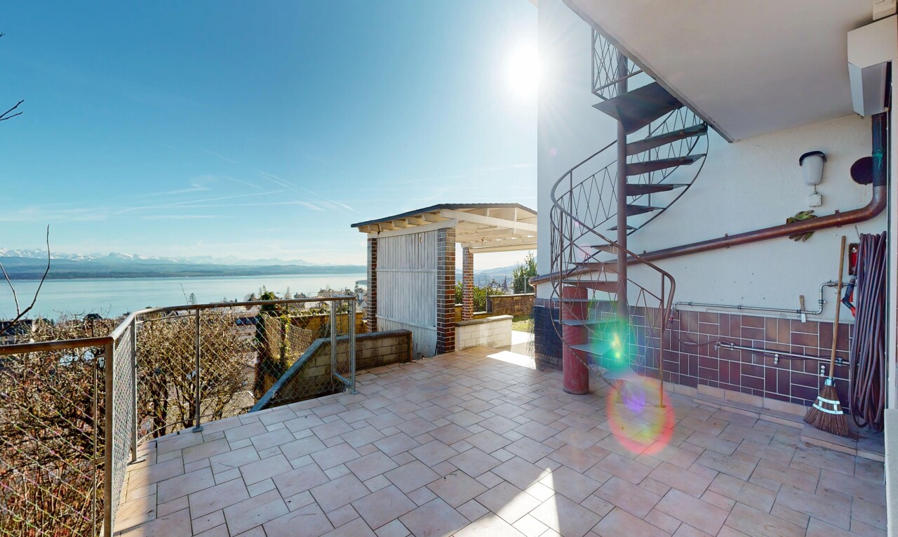 patio / terrace featuring a water view and a patio