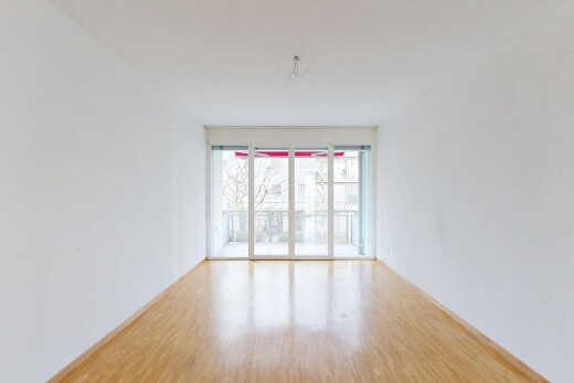 pièce vide avec wood finish floor, sol en finition bois, inside property, drywall, et cloison sèche