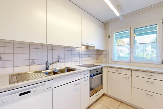 küche mit light countertops, arbeitsplatten, geschirrspülmaschine, light floor, und ofen
