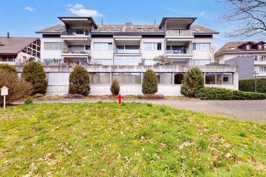 view of property featuring a yard