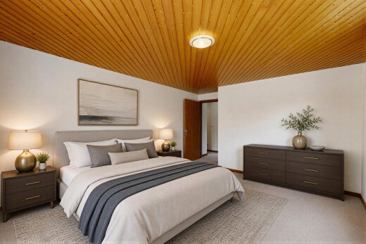 room featuring light carpet and wood ceiling