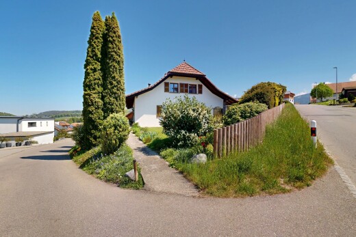 façade avec day time, bardage en stuc, et property visible