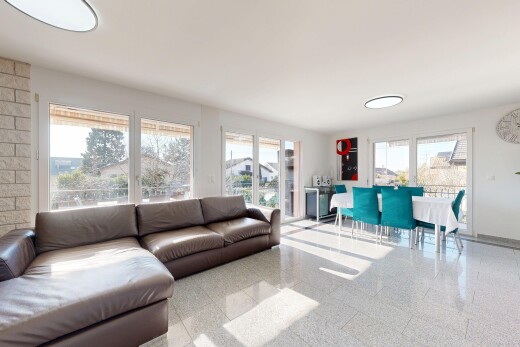 living room with granite floors