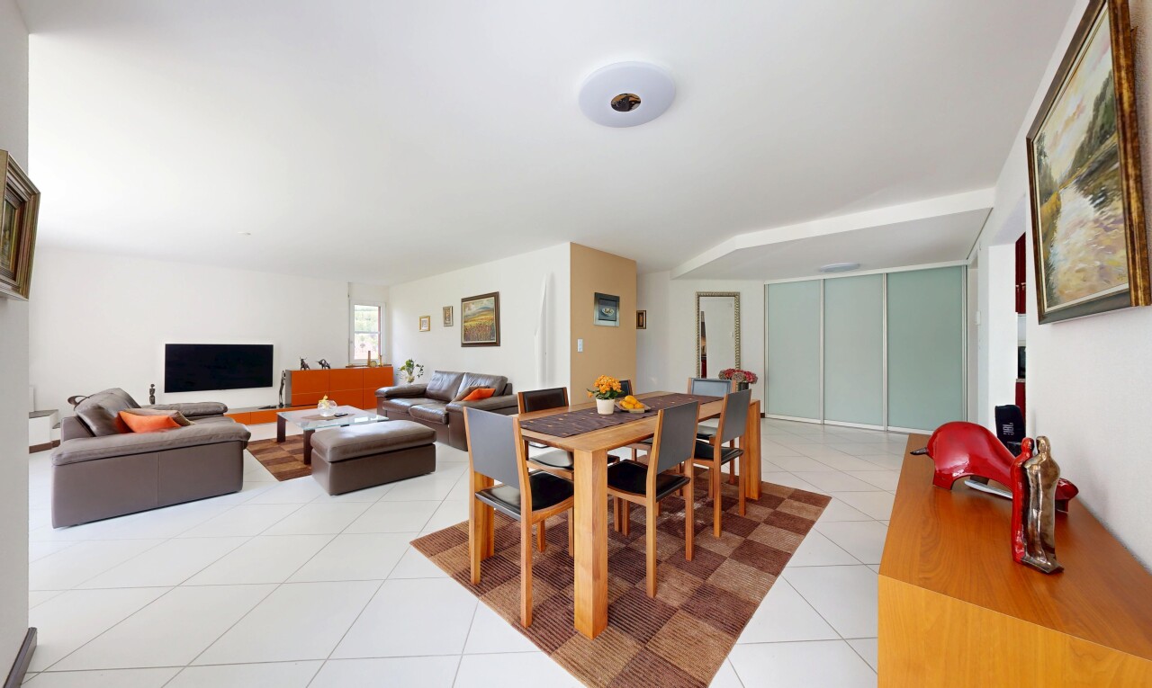 living area featuring light tile patterned floors