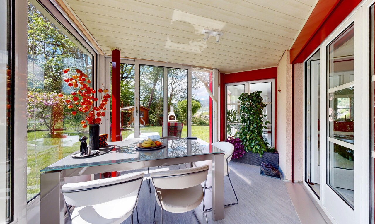 dining room featuring plenty of natural light, light wood-style floors, and wood ceiling
