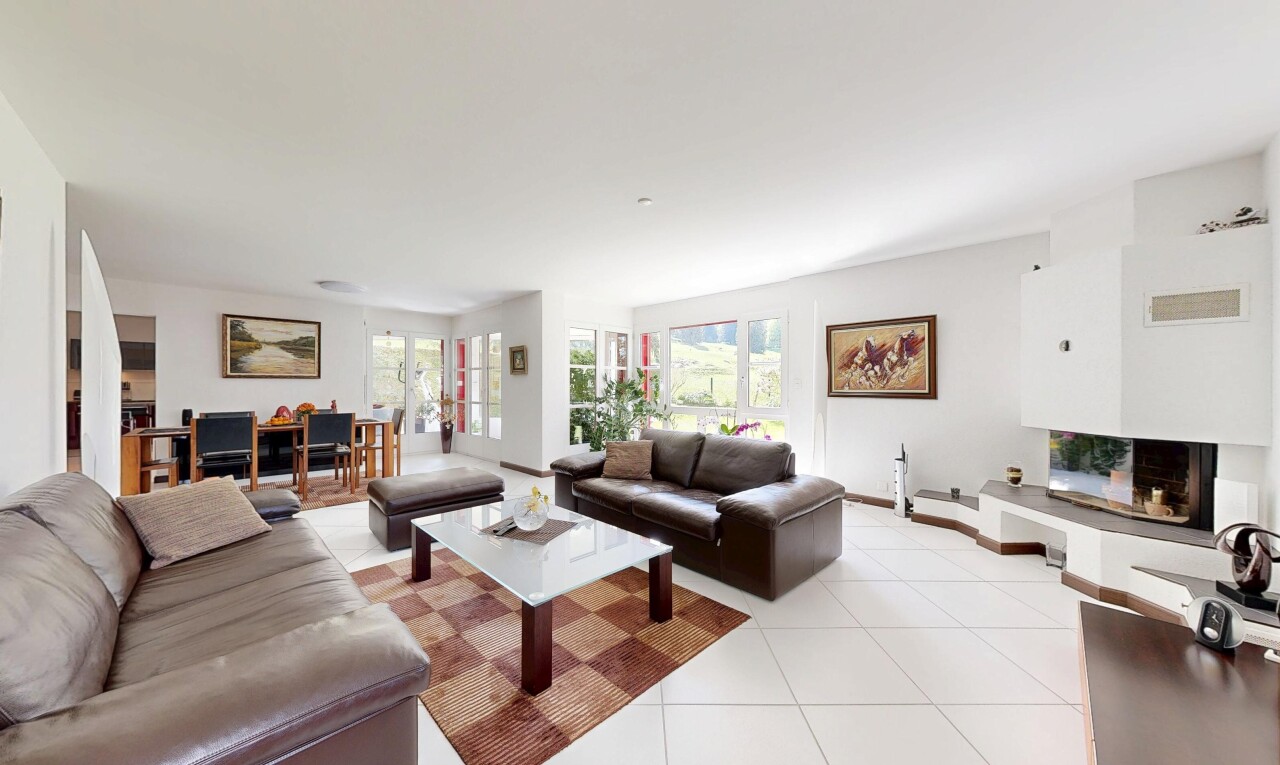 living / dining area featuring light tile patterned flooring