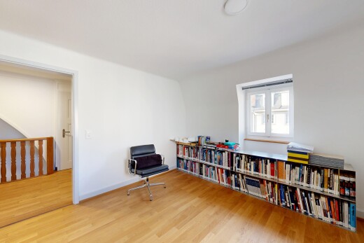 home office featuring light wood finished floors and baseboards