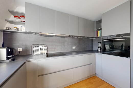 kitchen featuring open shelves, backsplash, black appliances, and light wood finished floors