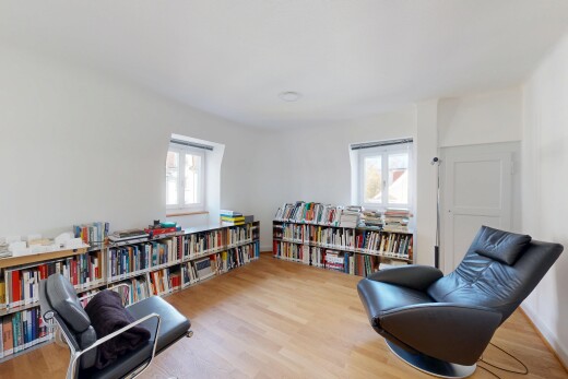 office space with plenty of natural light and wood finished floors