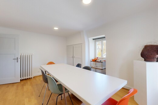 dining space with radiator heating unit, light wood-style flooring, and recessed lighting