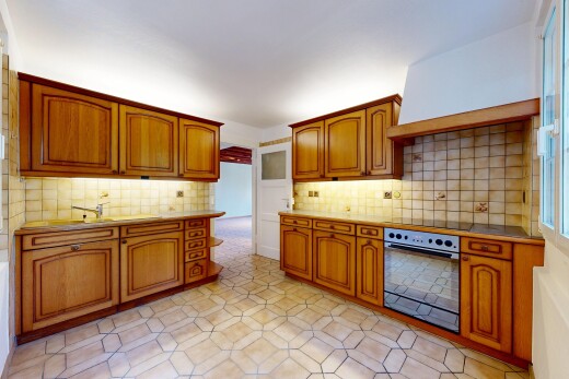 küche mit arched cabinets, bogenförmige schränke, ofen, light floor, und medium brown cabinets