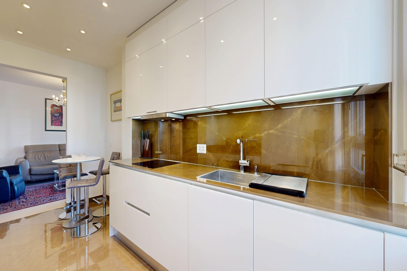 kitchen featuring white cabinetry, modern cabinets, decorative backsplash, recessed lighting, and black electric stovetop
