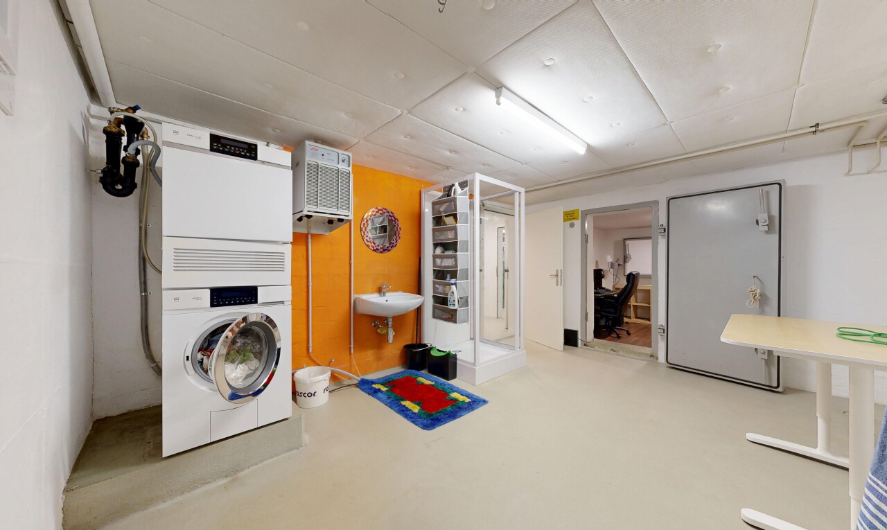 wäschekammer mit wäscherei, gipskartonwand, drywall, inside property, und finished concrete floor