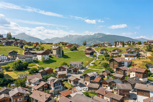 view of mountain background with nearby suburban area