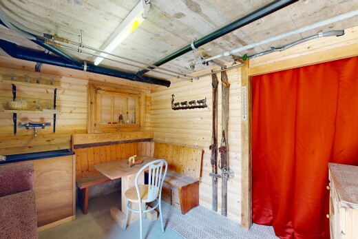 dining area featuring wooden walls