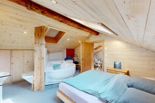 room featuring wood walls, recessed lighting, and a wooden ceiling with exposed beams