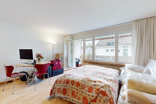 zimmer / schlafzimmer mit inside property, wood finish floor, holzfußboden, drywall, und gipskartonwand