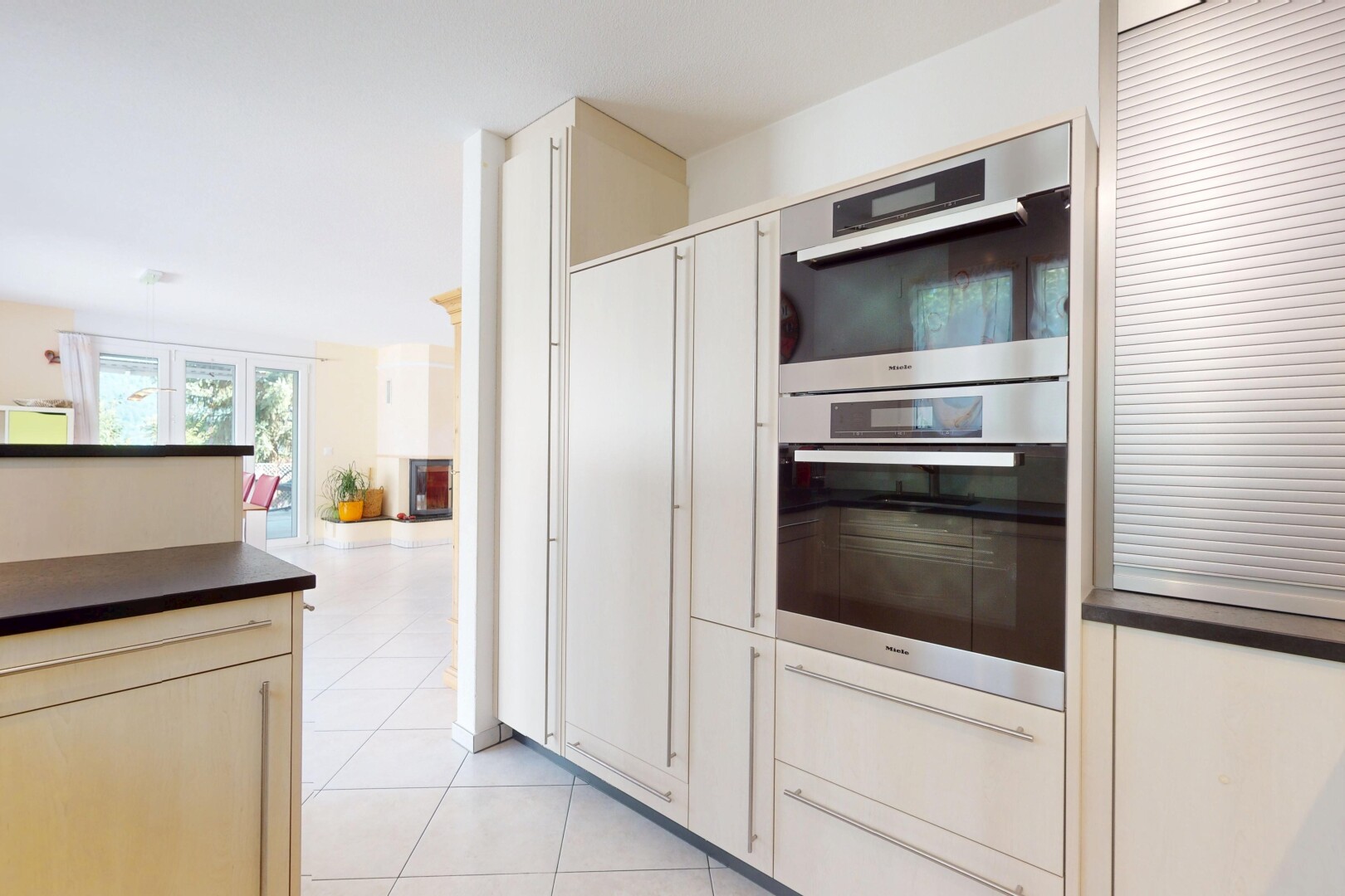 küche mit doppel backofen, tile floor, fliesenboden, arbeitsplatten, und inside property