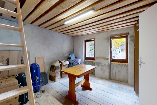 wohnzimmer mit wood finish floor, holzfußboden, hardwood floor, concrete wall, und betonmauer